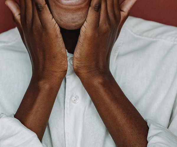 Smiling person feeling energetic and refreshed after a workout.